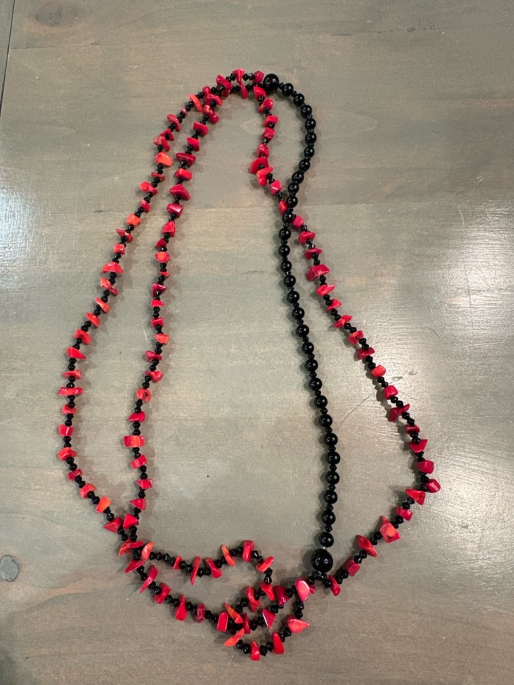 GENUINE CORAL AND ONYX BEADED TRIPLE STRAND NECKLACE